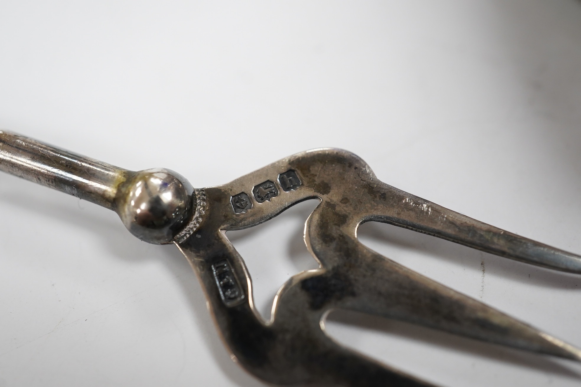 A small group of assorted silver items including mounted blue glass spill vase, 17.2cm, mounted shoe horn and button hook and a trinket dish, together with two other items. Condition - poor to fair